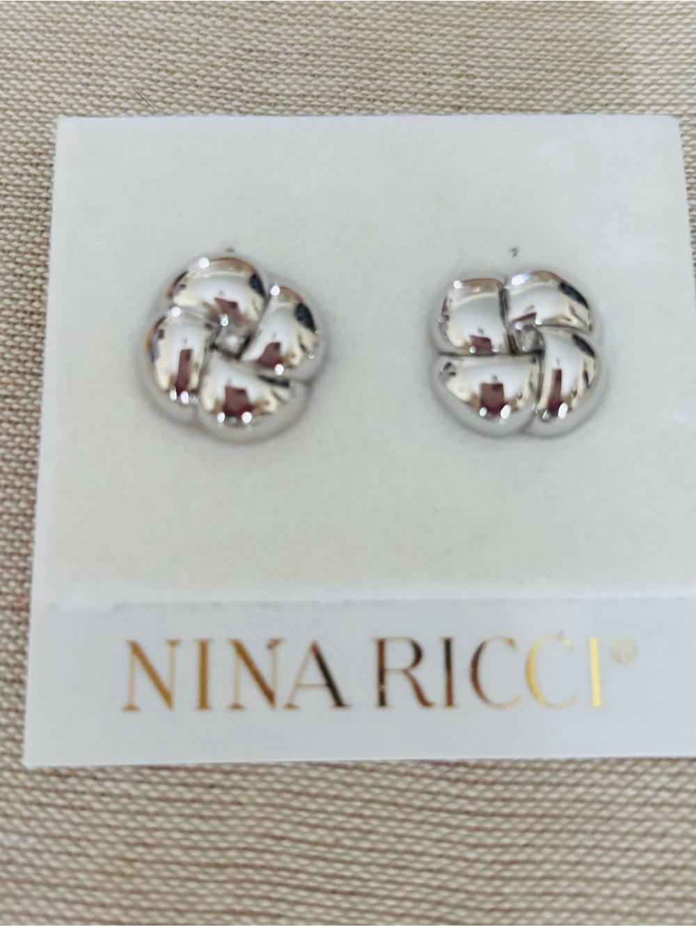 Nina Ricci Shiny Silver Knot Stud Earrings-NWT